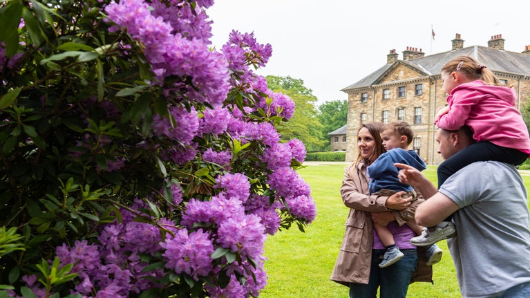 Visitors exploring the gardens at Ormesby Hall, North Yorkshire